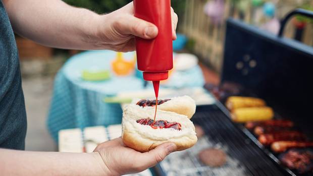 New information may make you reconsider what you put on your sausages this summer. (Photo / Getty)