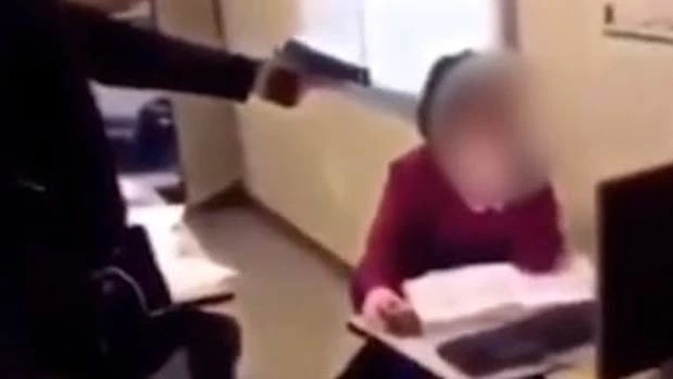 A 15-year-old schoolboy is facing prison after pointing a gun at a teacher.