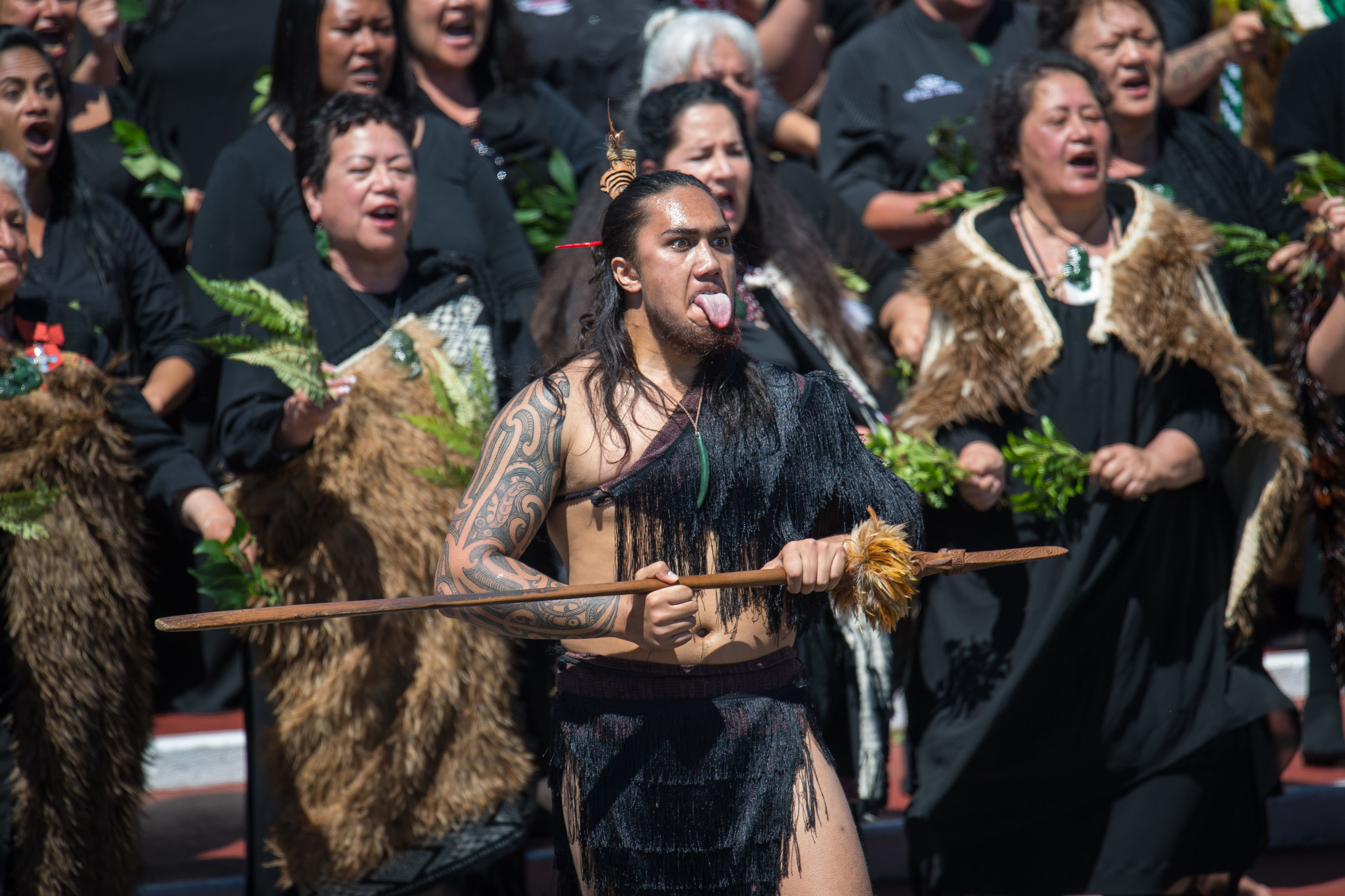 Maori people perform a haka during the visit of the Duke and Duchess of Sussex to Te Papaiouru, Ohinemutu, in Rotorua, before a lunch in honour of Harry and Meghan, on day four of the royal couple's tour of New Zealand. Photo / Getty Images