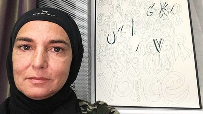Sinead O'Connor (pictured) has sparked outrage on Twitter by claiming she no longer wants to spend time with 'disgusting white people' after converting to Islam. Photo / Twitter Sinead O'Connor (pictured