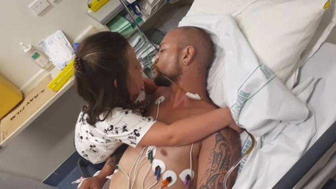 Critically-ill Napier man, Jarred Thompson has been reunited with his daughter in Auckland. Photo / Supplied