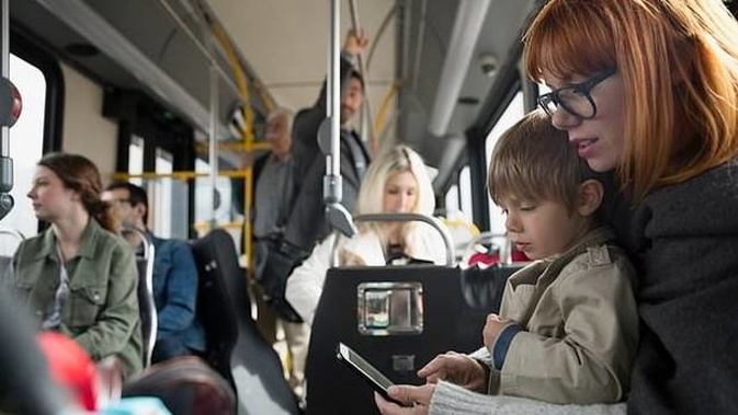 A woman has provoked a furious debate about children being made to give up their seats on public transport. Photo / Getty Images