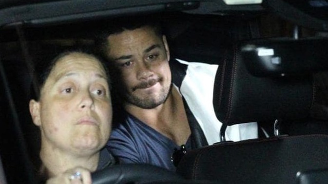 Jarryd Hayne was quickly driven away after being released by police. (Photo / News Corp Australia)