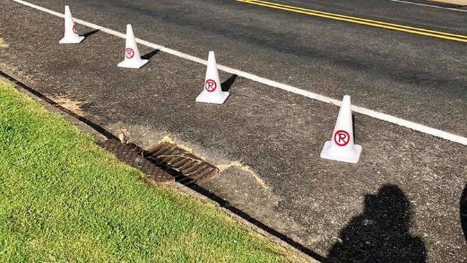 An East Auckland local is outraged after a person illegally put out cones to block access to public parking down her street yesterday. Photo / Supplied