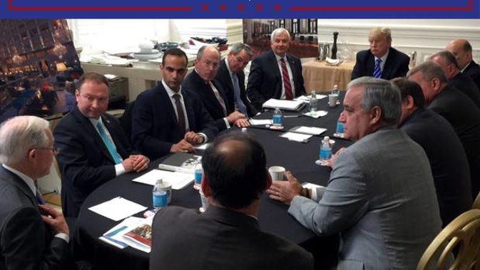 In this photo from President Donald Trump's Twitter account, George Papadopoulos, third from left, sits at a table with then-candidate Trump and others. Photo / AP