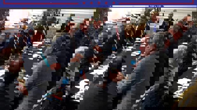 In this photo from President Donald Trump's Twitter account, George Papadopoulos, third from left, sits at a table with then-candidate Trump and others. Photo / AP