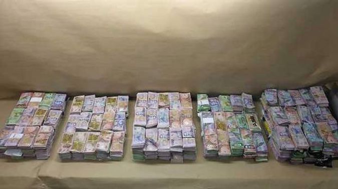Customs investigators seized $2m in cash stuffed into five rubbish bags. (Photo / Supplied)