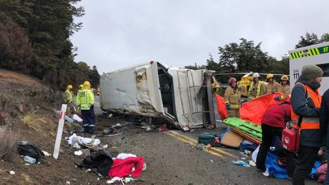 Emergency services worked to help the injured in the aftermath of a fatal bus crash near Tūroa skifield. Photo / Fenella Murphy