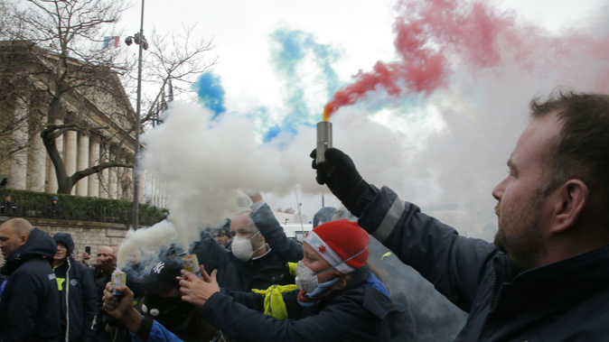 The protests have also been seen as an attack on President Emmanuel Macron. (Photo / AP)