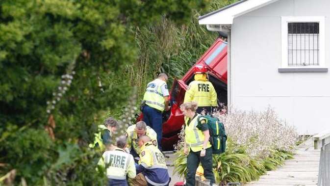 Emergency services attend to an accident on Somme Parade this afternoon. (Photo / Stuart Munro.)