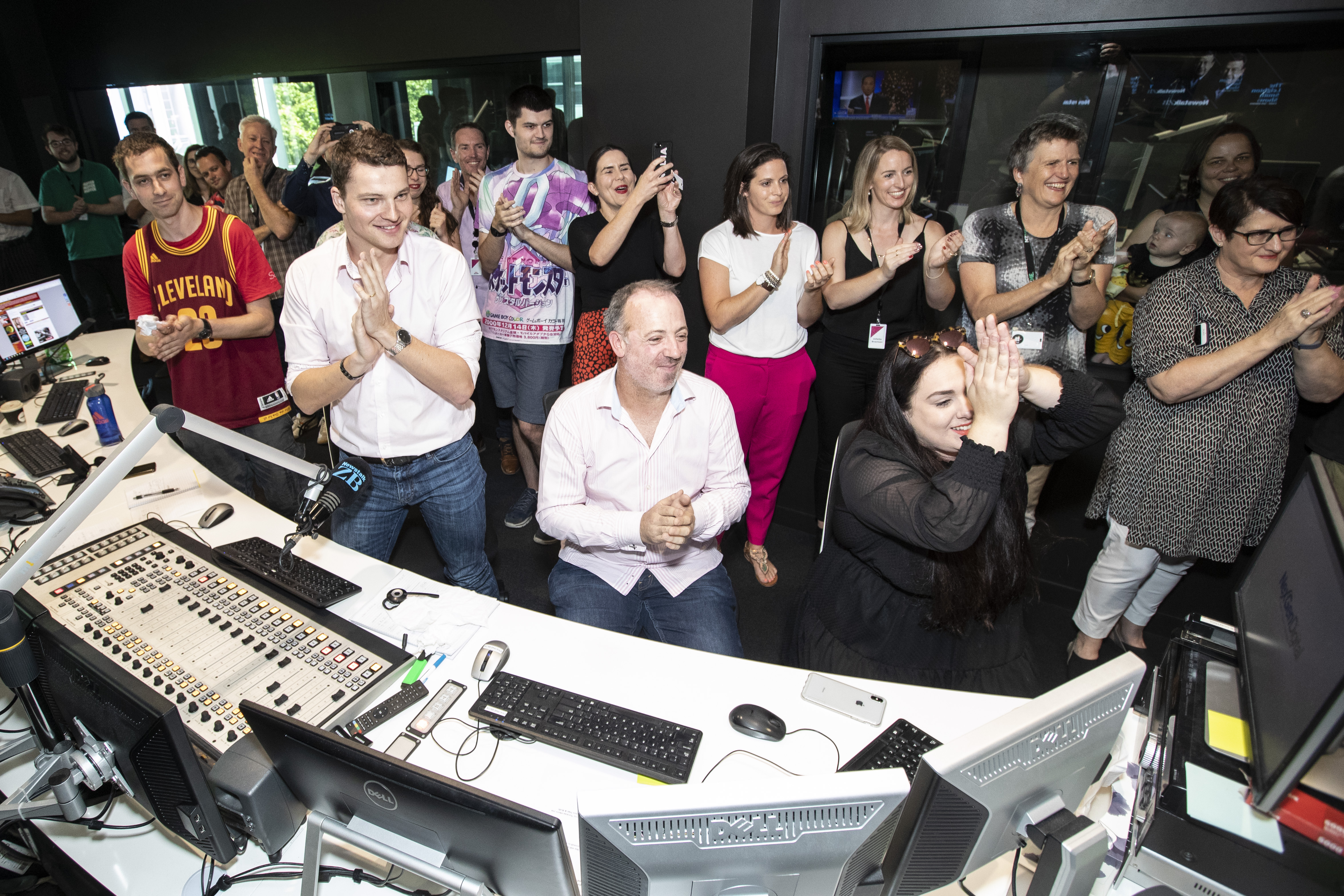 Over a dozen friends, family and colleagues were waiting to clap Leighton and Carolyn out of the studio. 