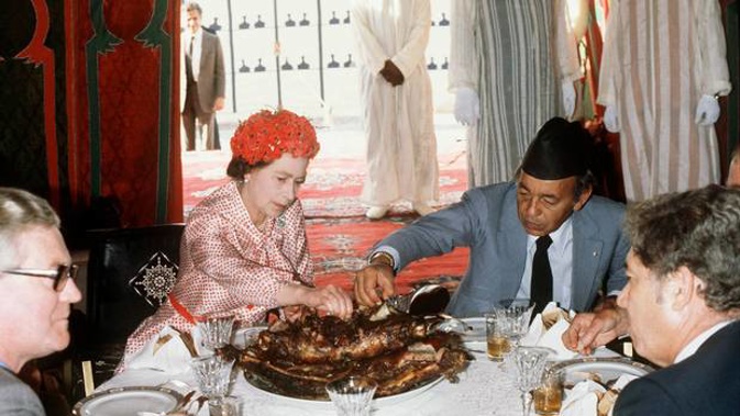 The Queen in Morocco in 1980 eating with her hands. Photo / Getty Images