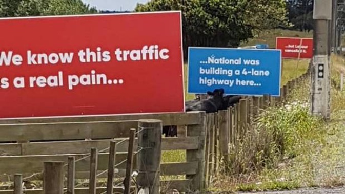 National Party hoardings near Wellsford, Northland, promoting highway upgrades that the National Party supports but the Government says are "gold-plated expressways". (Photo / Supplied0