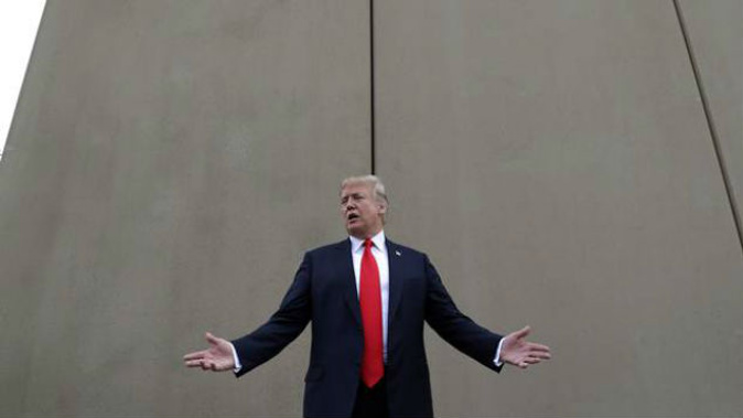 US President Donald Trump in March speaks during a tour as he reviews border wall prototypes in San Diego. Photo / AP