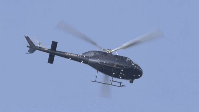 A police helicopter was in a near collision with a drone above Auckland last night. Photo / File