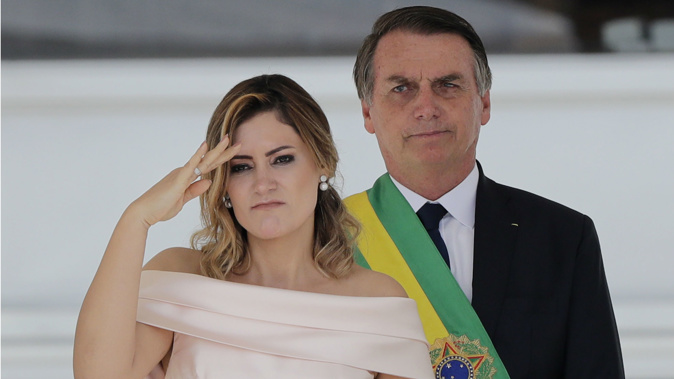 Brazil's new President Jair Bolsonaro with his wife Michelle at his inauguration. (Photo / AP)
