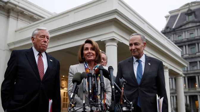 House Democratic leader Nancy Pelosi after meeting US President Donald Trump. With her are whip Steny Hoyer, left, and Senate Democratic leader Chuck Schumer. (Photo / AP)