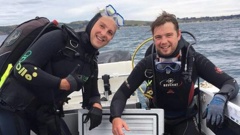 Matt, left, and Chris Williams were surprised to resurface and find their boat had gone. (Photo / Supplied)