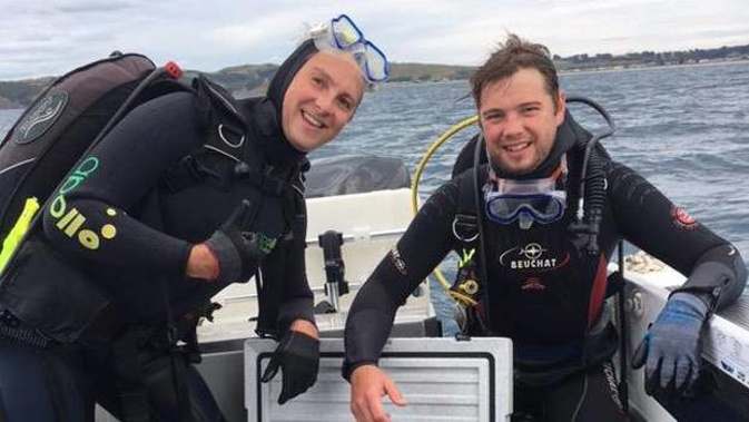 Matt, left, and Chris Williams were surprised to resurface and find their boat had gone. (Photo / Supplied)