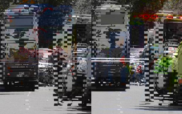 The crumpled remains of the blue Audi after a fatal head-on collision with a bus on Gowing Drive. (Photo / NZ Herald)