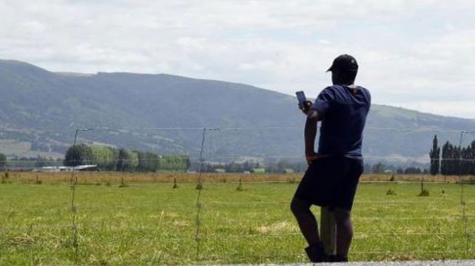 A Zimbabwean man now living in Dunedin is keeping a close eye on the downward spiral of violence in his home country. Photo / Stephen Jaquiery