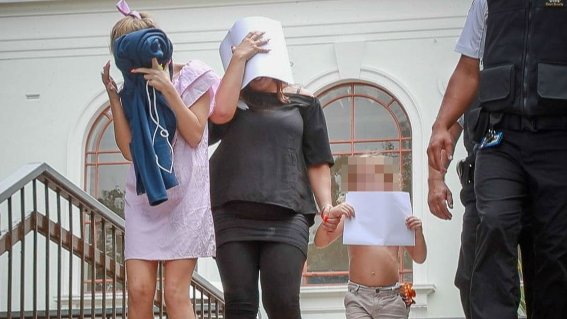 Some of the unruly tourists after a court appearance. (Photo / NZ Herald)