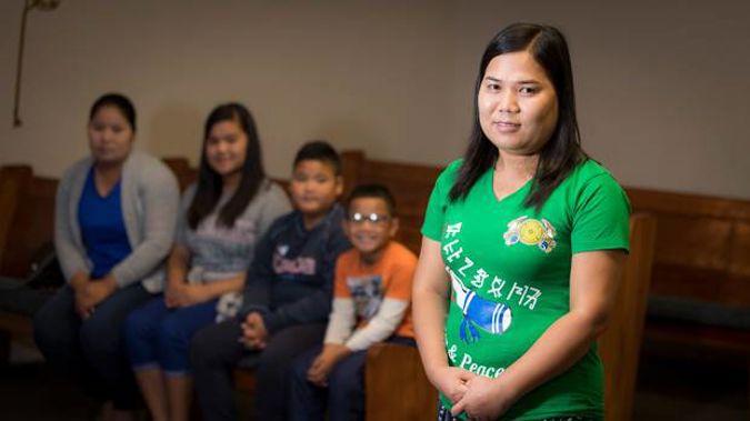 Dah Htoo Ukay, 27, has become the caregiver for her siblings (right to left) Po The Dah, 8, Jay, 11, Tha Dah, 13, and 29-year-old Cha Nu, 29. (Photo / Michael Craig)