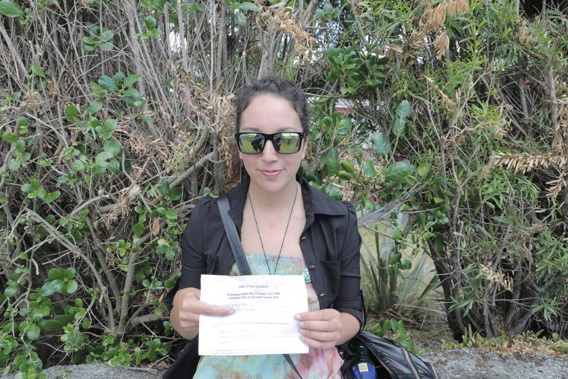 Josie Butler with her trespass notice at Te Tii Waitangi marae. (Photo / Michael Craig)