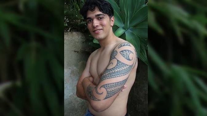 Marli Atu, 16, has been forced to cover up his traditional tatau tattoo at Glenfield College. (Photo / Graham Hooper)