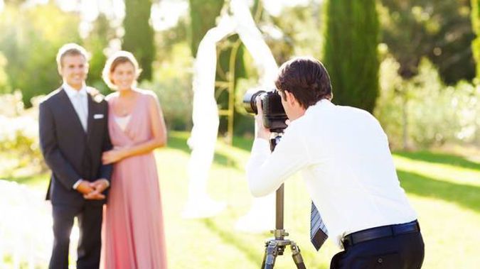 A Christchurch woman says a photographer who objected to her ad seeking a student to take her wedding photos for free urged people to whack her. Photo / Getty Images