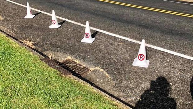 An East Auckland local was outraged after a person illegally put out cones to block access to public parking down her street. (Photo / Supplied)