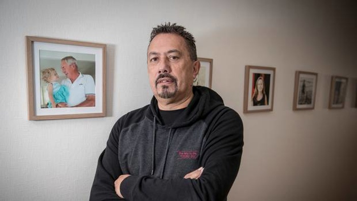 Comedian and mental health campaigner, Mike King, at home in 2017. Photo / Michael Craig