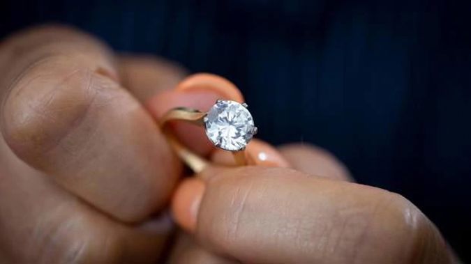 A woman going through a divorce discovered the diamond in her $189,000 engagement ring was replaced with a $1000 cubic zirconia. (Photo / Dean Purcell)