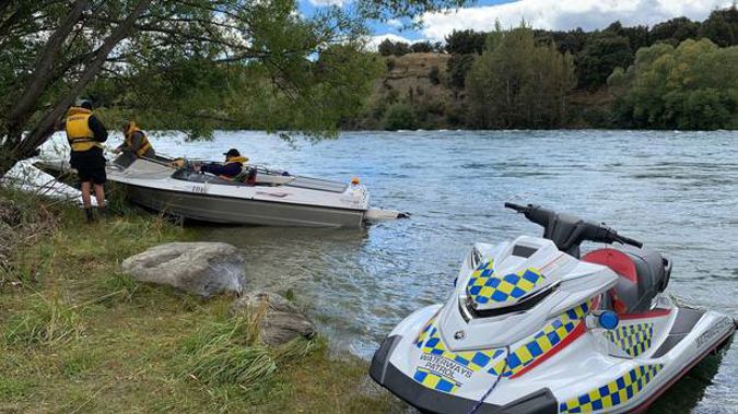 Police and emergency services rushed to the Hawea Flat area after reports of the crash. (Photo / James Allan)