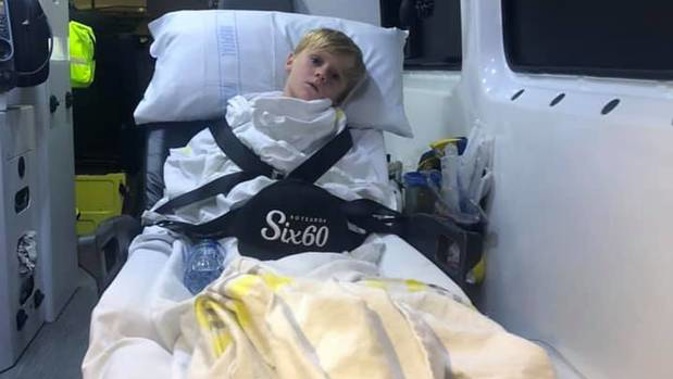 Riley Heath on the way to Starship Hospital after suffering a severe asthma attack triggered by smokers at the Six60 concert. (Photo / Supplied)