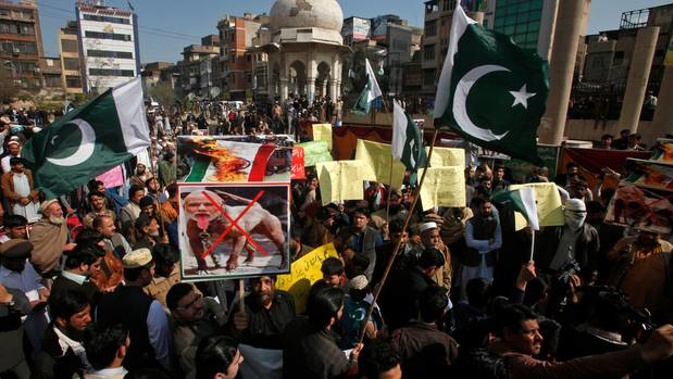 Pakistani protesters rally against India to denounce the recent killings by Indian forces in the disputed Himalayan region of Kashmir, in Peshawar this week. Photo / AP