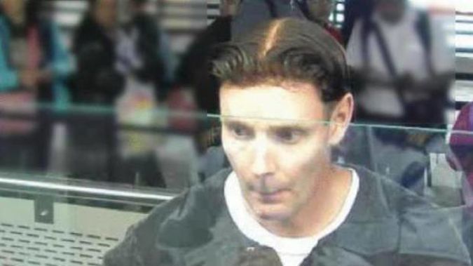 Phillip John Smith infamously wore a toupee while fleeing the country. (Photo / Police)