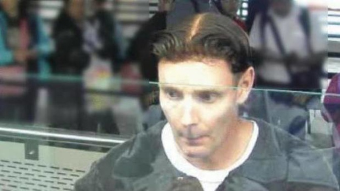 Phillip John Smith infamously wore a toupee while fleeing the country. (Photo / Police)