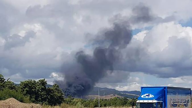 The wind was pushing the flames towards the south, a witness said. (Photo / Ash Wearing)