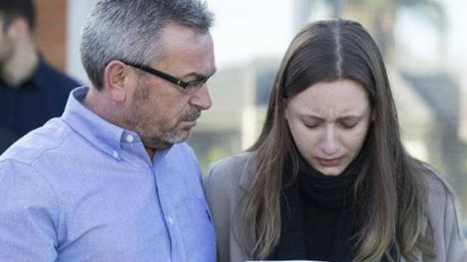 A heartbroken Sarah Ristevski stands by her father Borce as they plead for assistance in finding her mum Karen. (Photo / news.com.au)