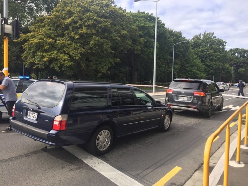 The hearses wait patiently for their terrible assignment at the Deans Avenue cordon. (Photo / Newstalk ZB)