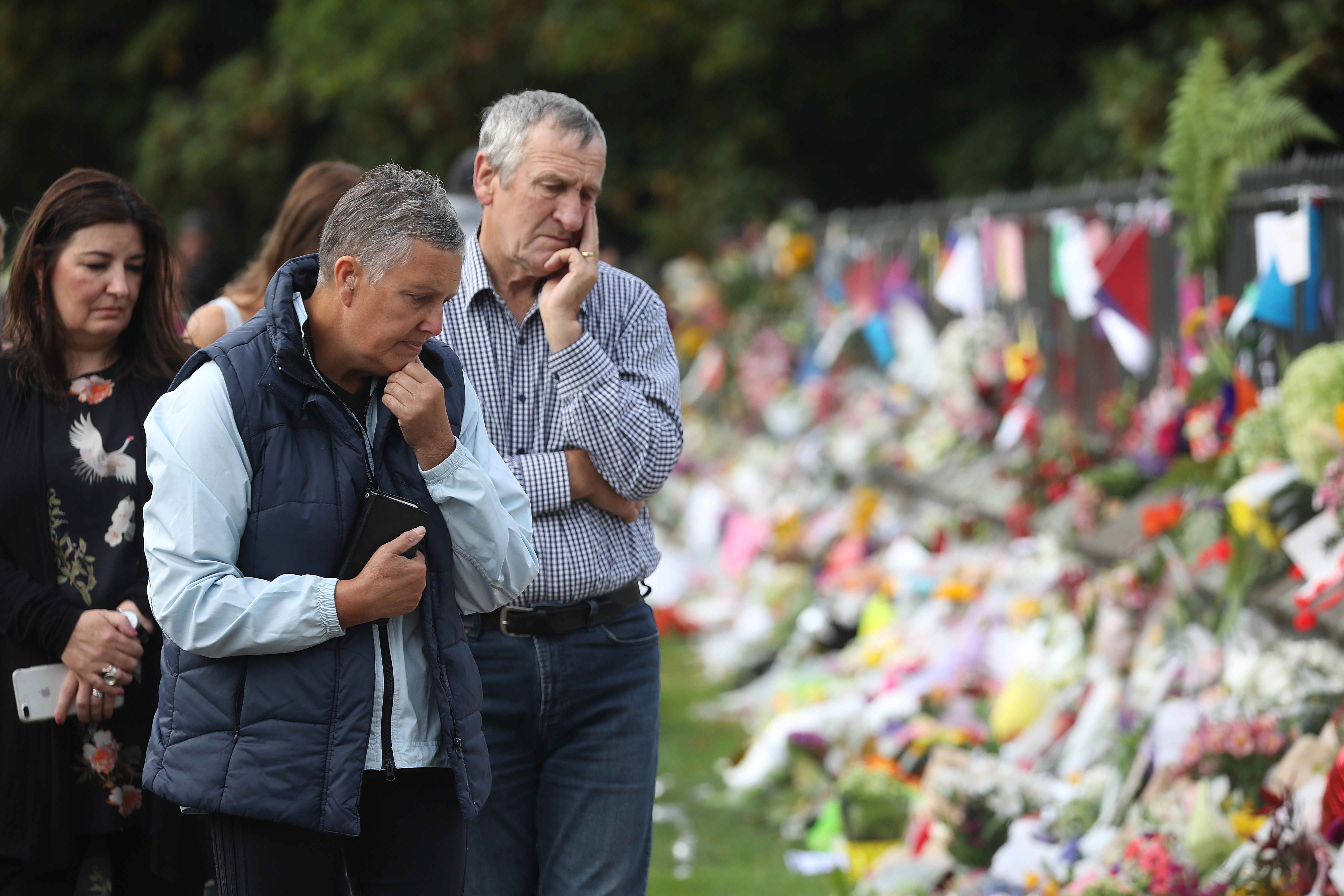 People pay their respects at a memorial outside the Botanical Gardens as a tribute to victims of the mosque attacks in Christchurch on March 17, 2019. Photo / Getty Images
