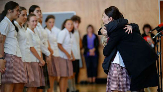 Prime Minister Jacinda Ardern hugs and consoles a student during a visit to Cashmere High School in Christchurch today. (Photo / AP)