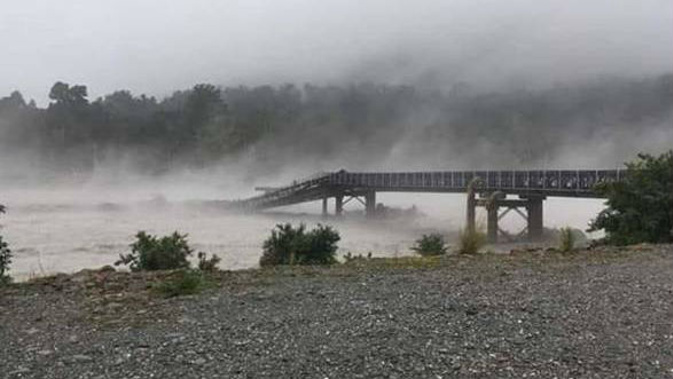 The bridge over the Waiho River at Haast washed away about 4.30pm.