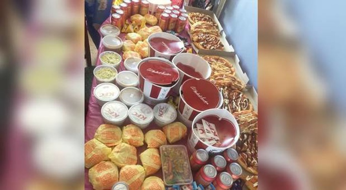 A Kiwi mum has been slammed by fellow parents after buying an excessive amount of McDonald's, KFC, pizzas and fizzy drink for her daughter's seventh birthday. Photo / Facebook