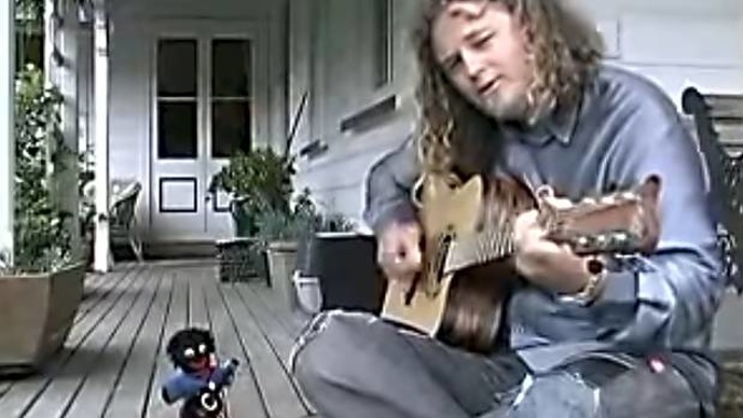 New Zealand singer songwriter Craig Smith in a still from his video for his children's song "Gollywog Song". (Photo / YouTube)