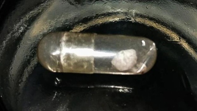 The pills are medium-sized clear capsules containing a chalky white powder that clumps together. Photo / KnowYourStuffNZ courtesy ODT