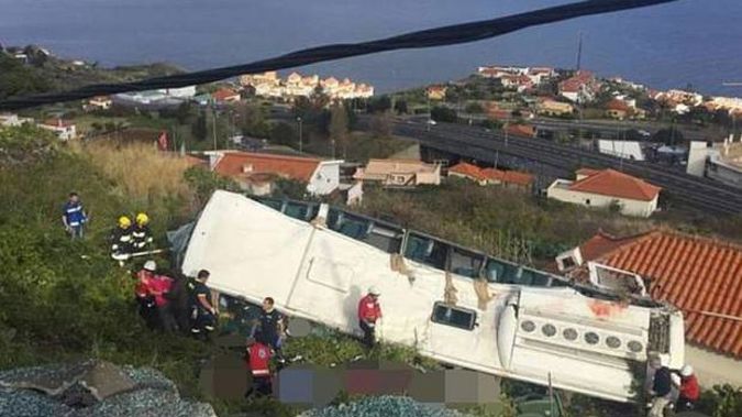 The bus is believed to have careered off a road on a bend and crashed down a hill on to a house. Photo / Twitter