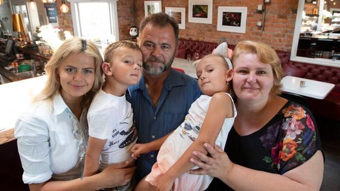 Nataliya Shchetkova with her husband, Alex Derecha and their daughter Daria and twins Alexander and Victoriya. Photo / File. 