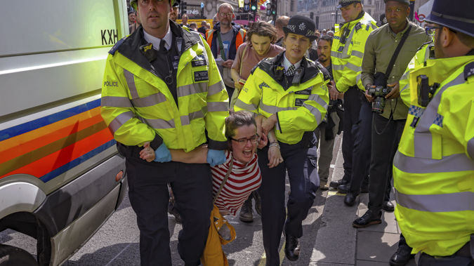 Hundreds of demonstrators have blocked central London sites. Photo / AP